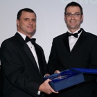 Brian Inkster receives the Innovation Award from Russell Thomson of British Waterways